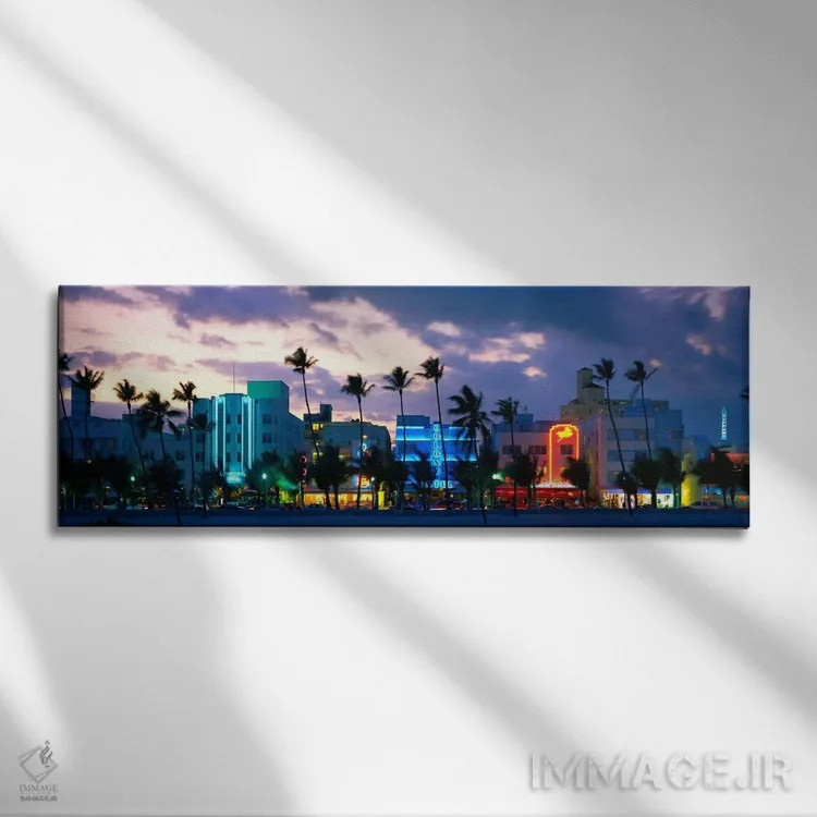 تابلو Ocean Drive, Miami Beach, Florida, USA,ساختمانهای روشن در غروب، اوشن درایو، میامی بیچ، فلوریدا، ایالات متحده اثر پانورامیک ایمجز (استودیو عکاسی عریض) - نمای روبهرو روی دیوار