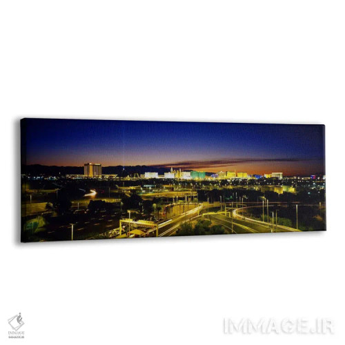تابلو Las Vegas, Nevada, USA,نمای بالا از ساختمانهای روشن در غروب، لاس وگاس، نوادا، ایالات متحده اثر پانورامیک ایمجز (استودیو عکاسی عریض) - نمای پرسپکتیو محصول