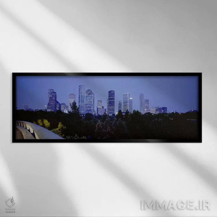تابلو Texas, USA,ساختمانهای روشن در غروب، هیوستون، تگزاس، ایالات متحده اثر پانورامیک ایمجز (استودیو عکاسی عریض) - نمای قابدار مشکی