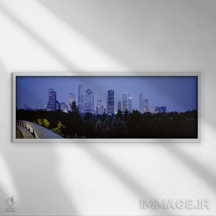 تابلو Texas, USA,ساختمانهای روشن در غروب، هیوستون، تگزاس، ایالات متحده اثر پانورامیک ایمجز (استودیو عکاسی عریض) - نمای قابدار سفید