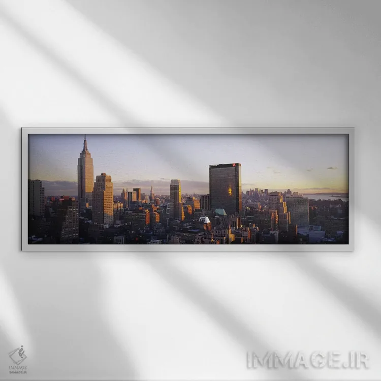 تابلو Manhattan, New York City, New York State, USA,ساختمانها در شهر، منهتن، نیویورک، ایالات متحده اثر پانورامیک ایمجز (استودیو عکاسی عریض) - نمای قابدار سفید