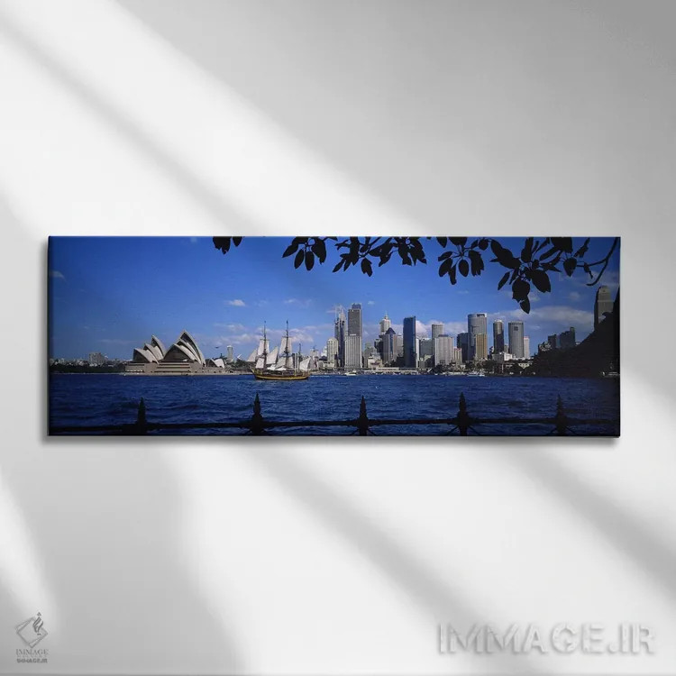 تابلو Sydney, New South Wales, Australia,نمای آسمانخط مرکز شهر و خانه اپرای سیدنی، سیدنی، نیوساوتولز، استرالیا اثر پانورامیک ایمجز (استودیو عکاسی عریض) - نمای روبهرو روی دیوار