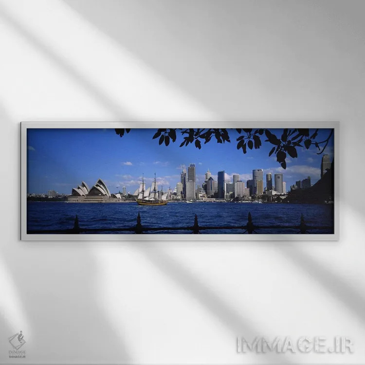 تابلو Sydney, New South Wales, Australia,نمای آسمانخط مرکز شهر و خانه اپرای سیدنی، سیدنی، نیوساوتولز، استرالیا اثر پانورامیک ایمجز (استودیو عکاسی عریض) - نمای قابدار سفید
