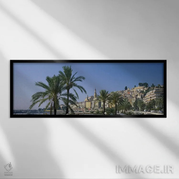 تابلو Menton, France,ساختمان در کنار ساحل، منتون، فرانسه اثر پانورامیک ایمجز (استودیو عکاسی عریض) - نمای قابدار مشکی
