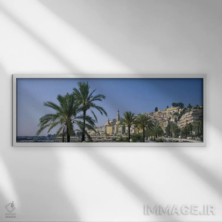 تابلو Menton, France,ساختمان در کنار ساحل، منتون، فرانسه اثر پانورامیک ایمجز (استودیو عکاسی عریض) - نمای قابدار سفید
