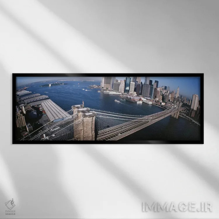 تابلو New York, Brooklyn Bridge, aerial #2,آمریکا، نیویورک، پل بروکلین، نمای هوایی شماره ۲ اثر پانورامیک ایمجز (استودیو عکاسی عریض) - نمای قابدار مشکی
