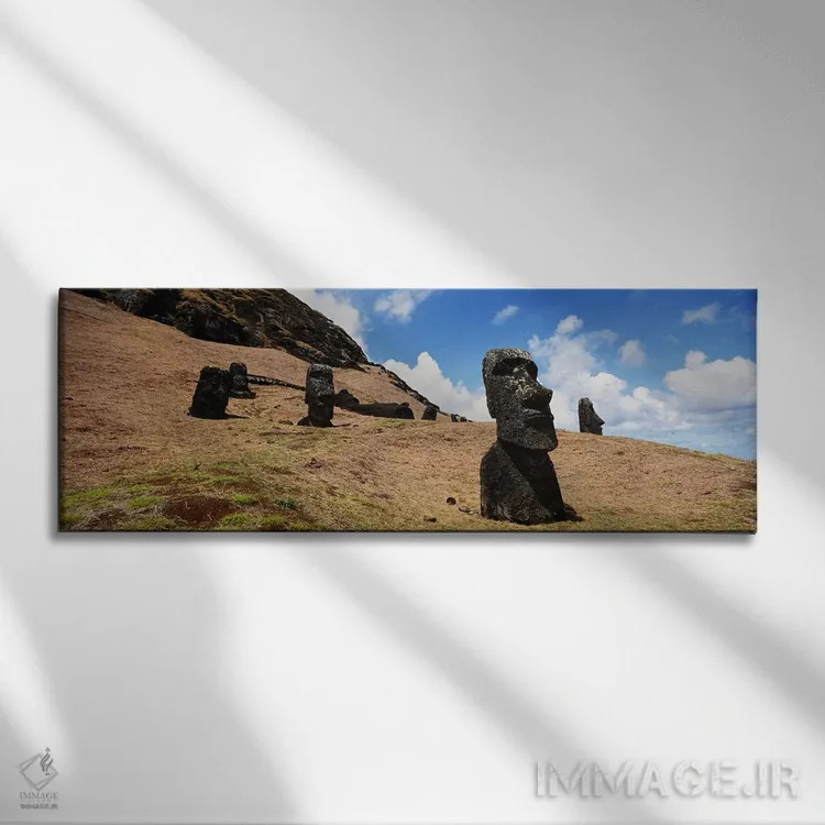 تابلو Tahai Archaeological Site, Rano Raraku, Easter Island, Chile,نمای پایین از مجسمههای موآی، محوطه باستانی تاحای، رانو رااراکو، جزیره ایستر، شیلی اثر پانورامیک ایمجز (استودیو عکاسی عریض) - نمای روبهرو روی دیوار