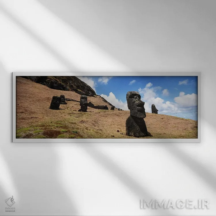 تابلو Tahai Archaeological Site, Rano Raraku, Easter Island, Chile,نمای پایین از مجسمههای موآی، محوطه باستانی تاحای، رانو رااراکو، جزیره ایستر، شیلی اثر پانورامیک ایمجز (استودیو عکاسی عریض) - نمای قابدار سفید