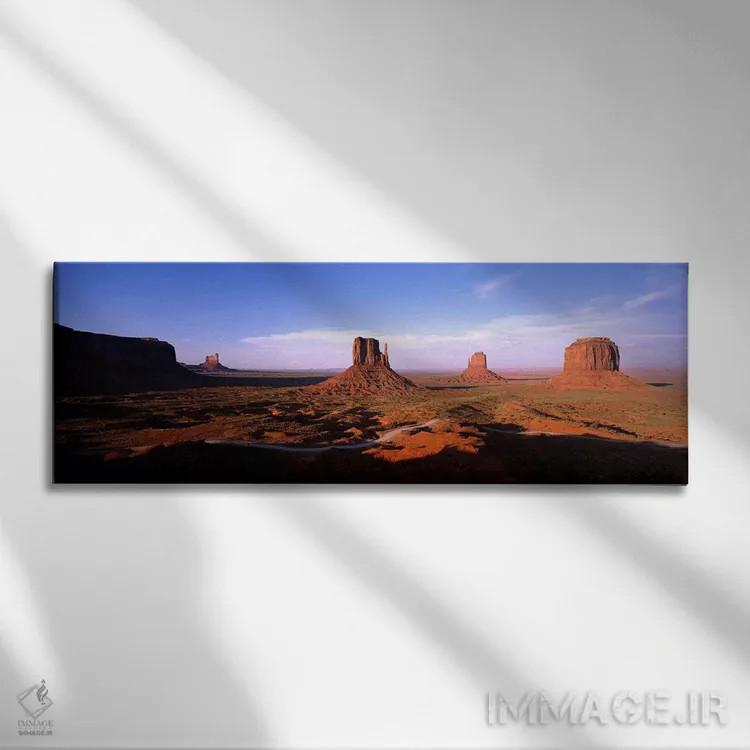 تابلو Monument Valley, Navajo Nation, Arizona, USA,سایههای روز نزدیک میتنز و بوت مریِک، دره مانیومنت، ملت ناواهو، آریزونا، آمریکا اثر پانورامیک ایمجز (استودیو عکاسی عریض) - نمای روبهرو روی دیوار