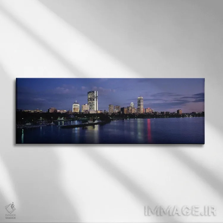 تابلو At DuskBoston, Massachusetts, USA,ساختمانهای کنار آب، هنگام غروب، بوستون، ماساچوست، ایالات متحده آمریکا اثر پانورامیک ایمجز (استودیو عکاسی عریض) - نمای روبهرو روی دیوار