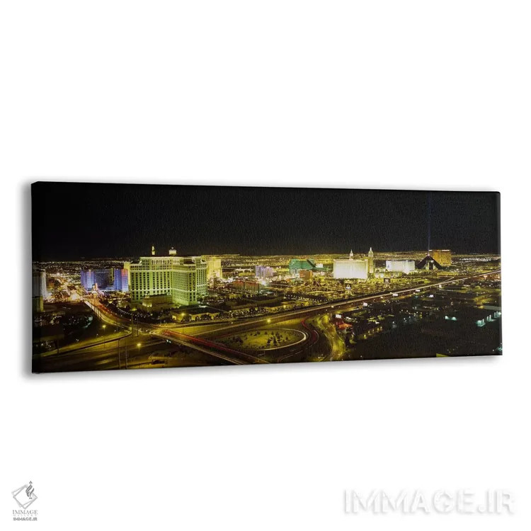 تابلو Nevada, USA,نمای زاویه بالا از ساختمانهای روشنشده در شب، لاس وگاس، نوادا، ایالات متحده آمریکا اثر پانورامیک ایمجز (استودیو عکاسی عریض) - نمای پرسپکتیو محصول