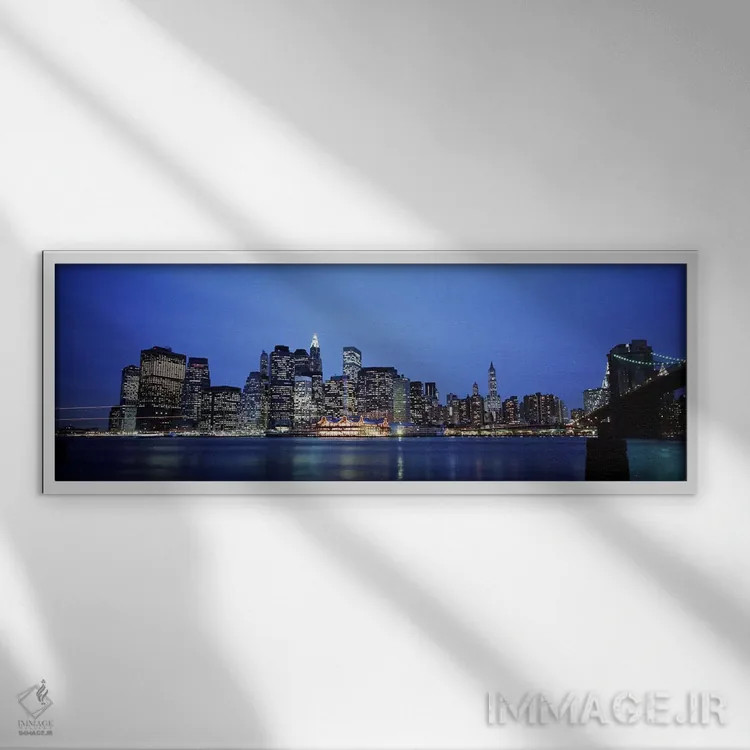 تابلو Manhattan, New York City, New York State, USA,ساختمانهای کنار آب، منهتن، نیویورک سیتی، ایالت نیویورک، ایالات متحده آمریکا اثر پانورامیک ایمجز (استودیو عکاسی عریض) - نمای قابدار سفید