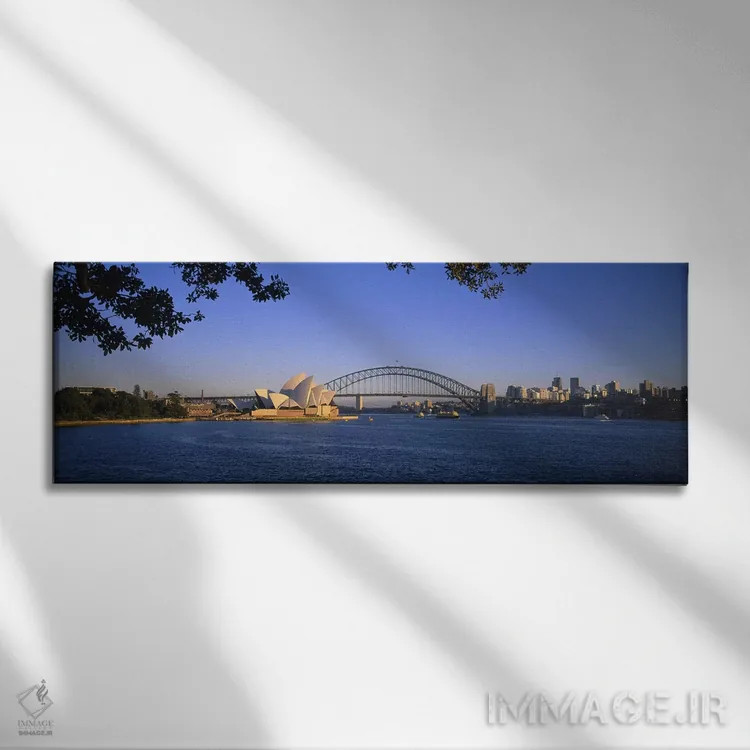 تابلو Sydney, New South Wales, Australia,نمای دور از پل بندر سیدنی و اپرای سیدنی، سیدنی، نیوساوثولز، استرالیا اثر پانورامیک ایمجز (استودیو عکاسی عریض) - نمای روبهرو روی دیوار