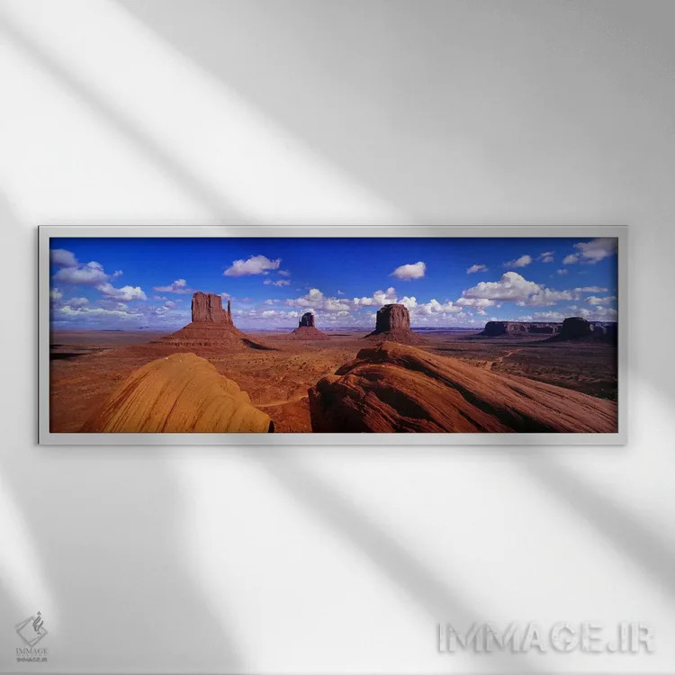 تابلو Monument Valley, Navajo Nation, Arizona, USA,صخرههای میتنز و مریک بات، دره یادبود، ملت ناواهو، آریزونا، ایالات متحده آمریکا اثر پانورامیک ایمجز (استودیو عکاسی عریض) - نمای قابدار سفید
