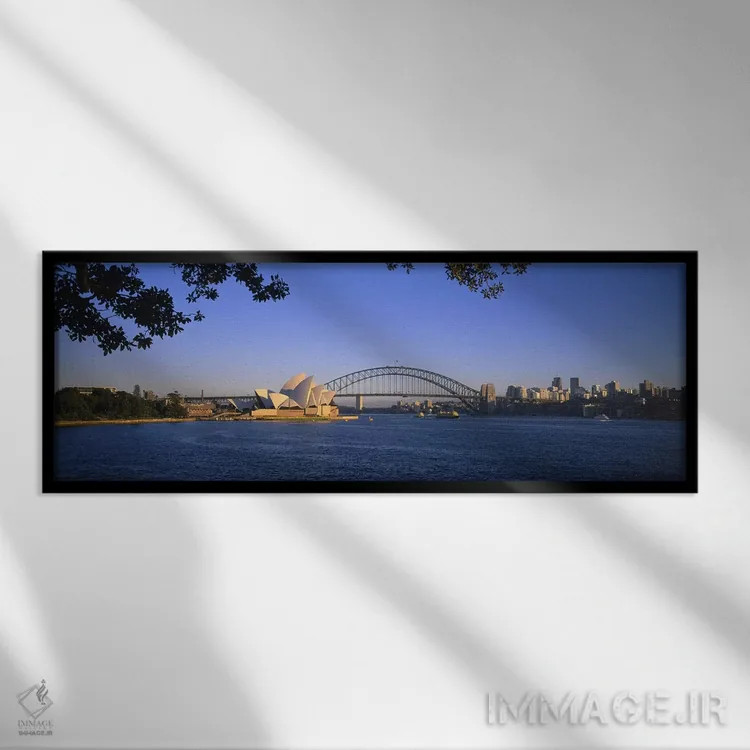 تابلو Sydney, New South Wales, Australia,نمای دور از پل بندر سیدنی و اپرای سیدنی، سیدنی، نیوساوثولز، استرالیا اثر پانورامیک ایمجز (استودیو عکاسی عریض) - نمای قابدار مشکی