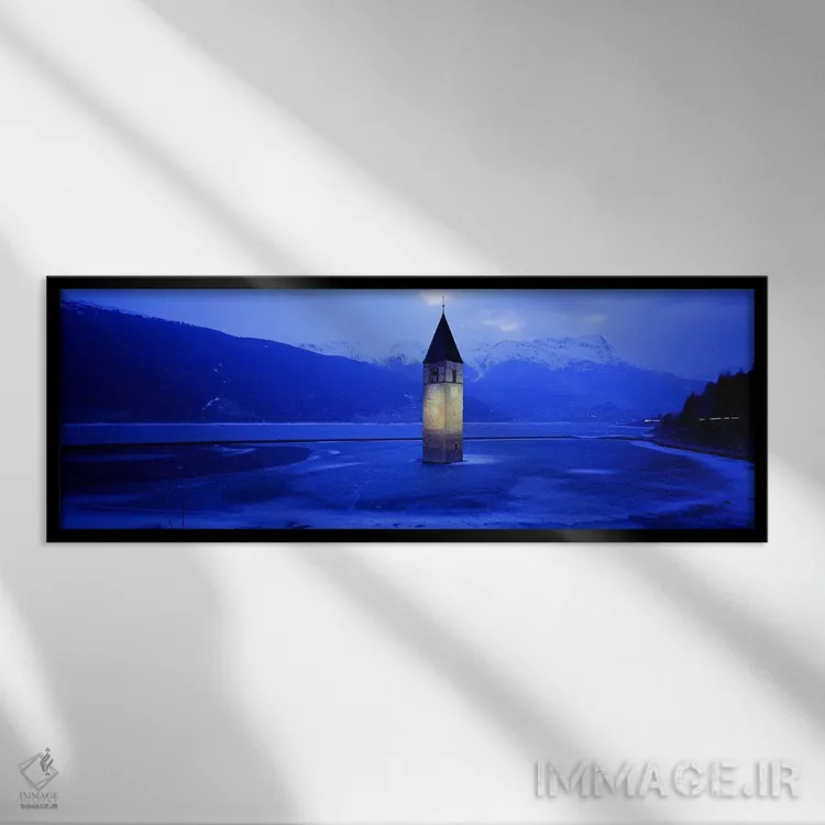 تابلو Lago di Resia, South Tyrol, Italy,برج ناقوس کمپانیله دی کورون در زمستان، دریاچه رِزیا، تیرول جنوبی، ایتالیا اثر پانورامیک ایمجز (استودیو عکاسی عریض) - نمای قابدار مشکی