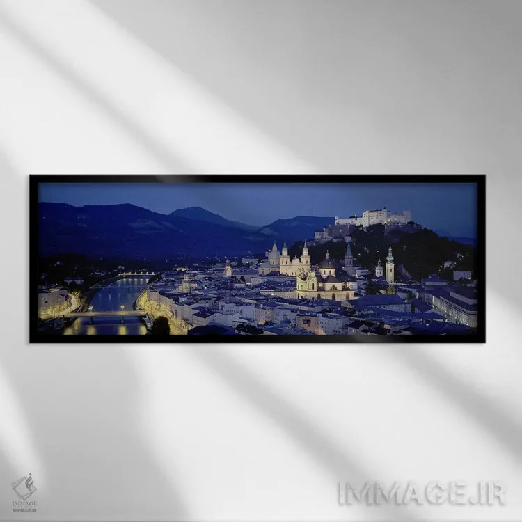 تابلو Salzburg, Austria,نمای زاویه بالا از ساختمانهای شهر، زالتسبورگ، اتریش اثر پانورامیک ایمجز (استودیو عکاسی عریض) - نمای قابدار مشکی