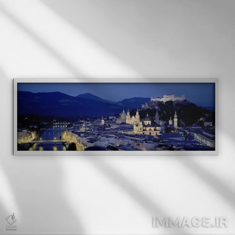 تابلو Salzburg, Austria,نمای زاویه بالا از ساختمانهای شهر، زالتسبورگ، اتریش اثر پانورامیک ایمجز (استودیو عکاسی عریض) - نمای قابدار سفید