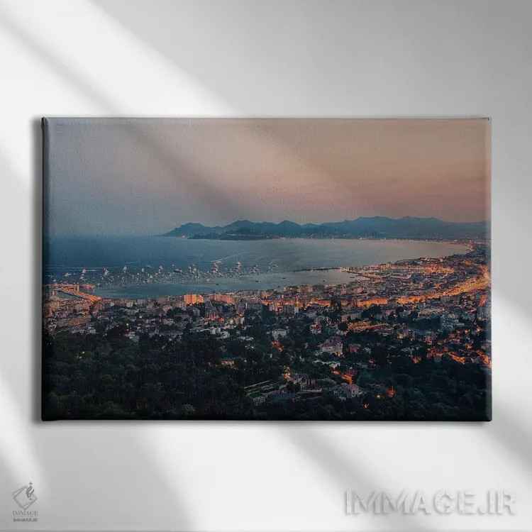 تابلو غروب در کن اثر مانجیک پیکچرز (استودیو عکاسی یا فیلمسازی) - نمای روبهرو روی دیوار