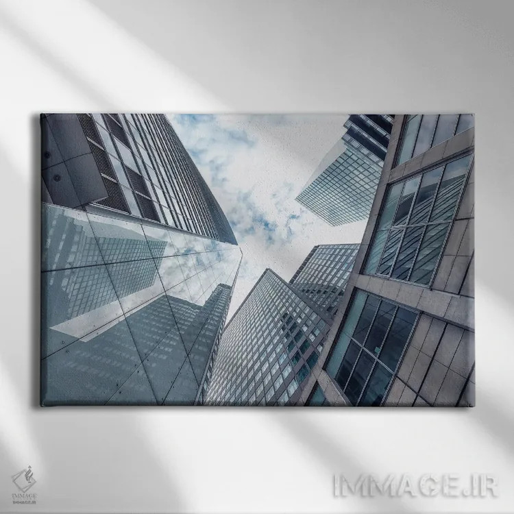 تابلو ساختمانها در فرانکفورت اثر مانجیک پیکچرز (استودیو عکاسی یا فیلمسازی) - نمای روبهرو روی دیوار