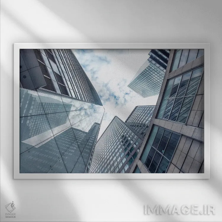 تابلو ساختمانها در فرانکفورت اثر مانجیک پیکچرز (استودیو عکاسی یا فیلمسازی) - نمای قابدار سفید
