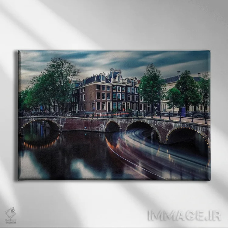 تابلو آمستردام زیبا اثر مانجیک پیکچرز (استودیو عکاسی یا فیلمسازی) - نمای روبهرو روی دیوار