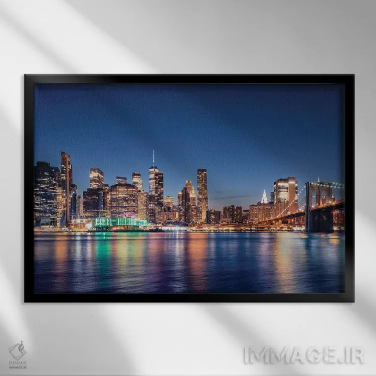 تابلو پایین منهتن در شب اثر مانجیک پیکچرز (استودیو عکاسی یا فیلمسازی) - نمای قابدار مشکی