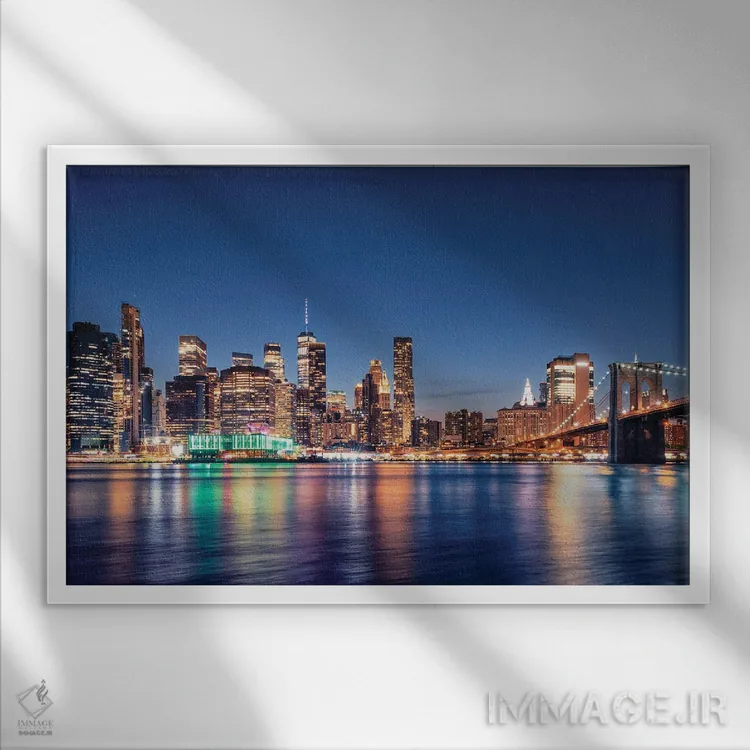 تابلو پایین منهتن در شب اثر مانجیک پیکچرز (استودیو عکاسی یا فیلمسازی) - نمای قابدار سفید