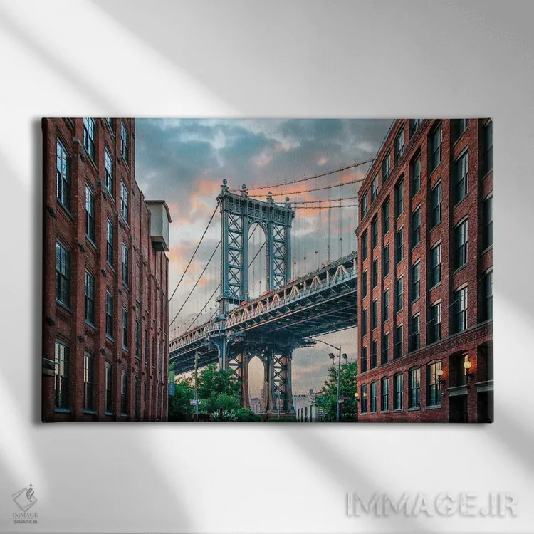 تابلو پل منهتن در غروب اثر مانجیک پیکچرز (استودیو عکاسی یا فیلمسازی) - نمای روبهرو روی دیوار