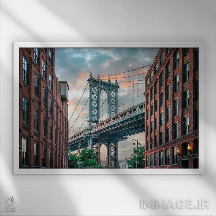 تابلو پل منهتن در غروب اثر مانجیک پیکچرز (استودیو عکاسی یا فیلمسازی) - نمای قابدار سفید