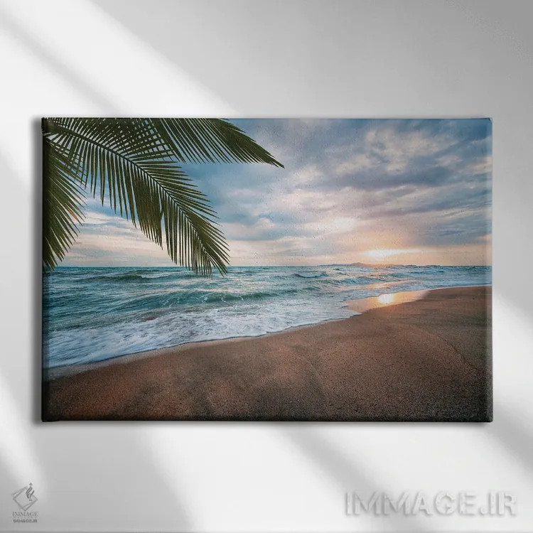 تابلو غروب در ساحل اثر مانجیک پیکچرز (استودیو عکاسی یا فیلمسازی) - نمای روبهرو روی دیوار