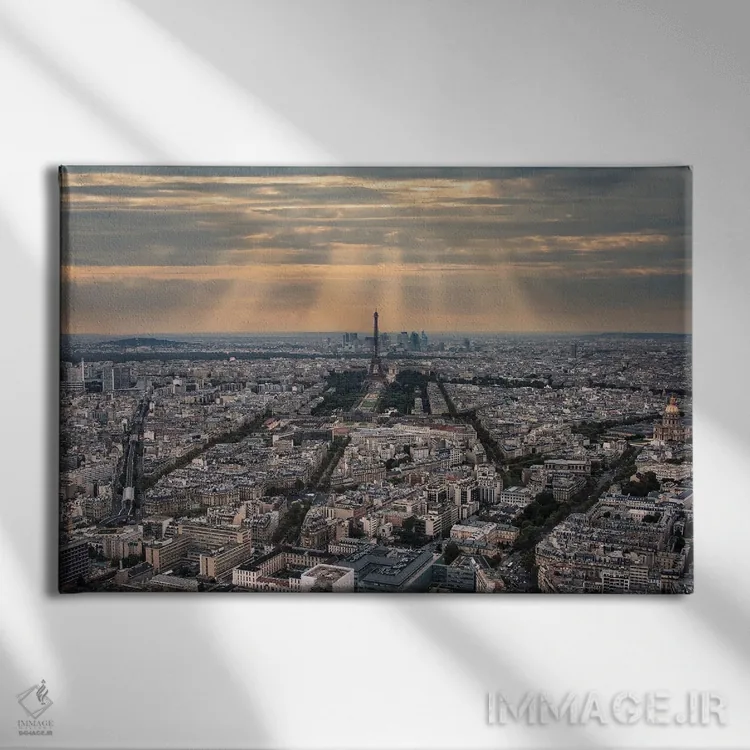 تابلو پرتو خورشید بر شهر پاریس اثر مانجیک پیکچرز (استودیو عکاسی یا فیلمسازی) - نمای روبهرو روی دیوار