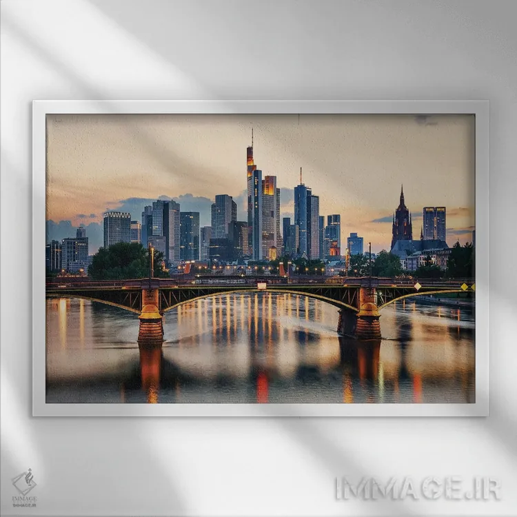 تابلو غروب فرانکفورت اثر مانجیک پیکچرز (استودیو عکاسی یا فیلمسازی) - نمای قابدار سفید