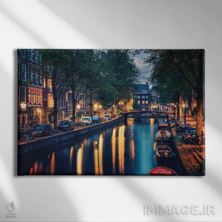 تابلو غروب آمستردام اثر مانجیک پیکچرز (استودیو عکاسی یا فیلمسازی) - نمای روبهرو روی دیوار