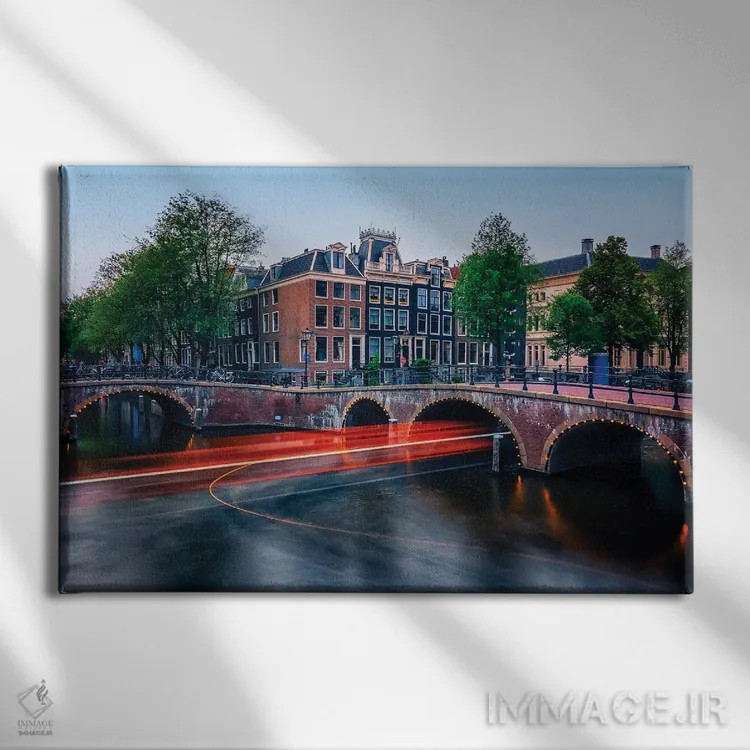 تابلو آمستردام در غروب اثر مانجیک پیکچرز (استودیو عکاسی یا فیلمسازی) - نمای روبهرو روی دیوار