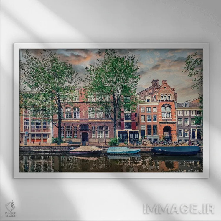 تابلو آمستردام در غروب اثر مانجیک پیکچرز (استودیو عکاسی یا فیلمسازی) - نمای قابدار سفید