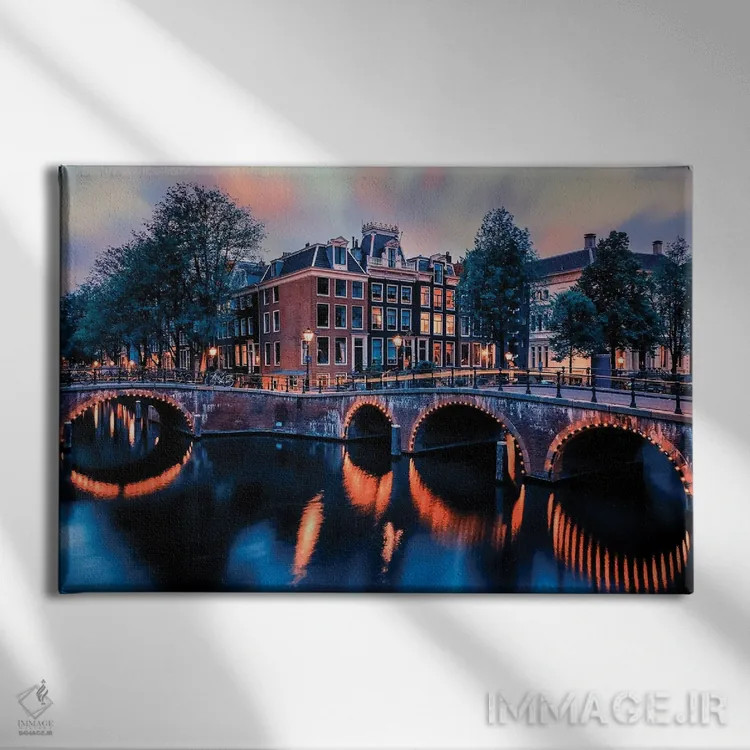 تابلو غروب آفتاب در آمستردام اثر مانجیک پیکچرز (استودیو عکاسی یا فیلمسازی) - نمای روبهرو روی دیوار