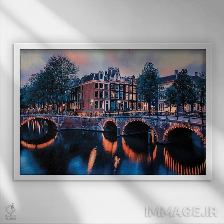 تابلو غروب آفتاب در آمستردام اثر مانجیک پیکچرز (استودیو عکاسی یا فیلمسازی) - نمای قابدار سفید