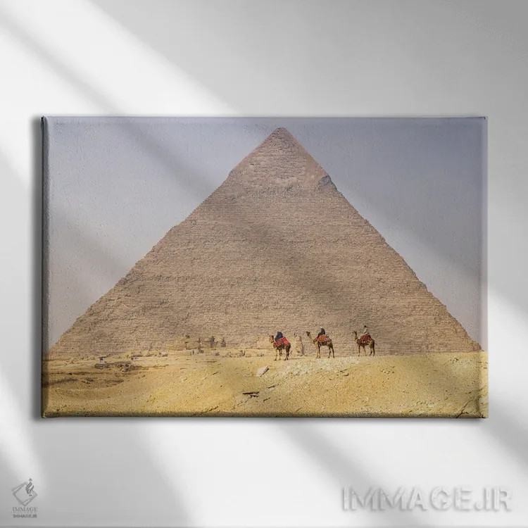 تابلو Cairo, Egypt. Men On Camels At The Great Pyramid Complex.,جیزه، قاهره، مصر. مردان سوار بر شتر در مجموعه اهرام بزرگ اثر امیلی ام ویلسون - نمای روبهرو روی دیوار
