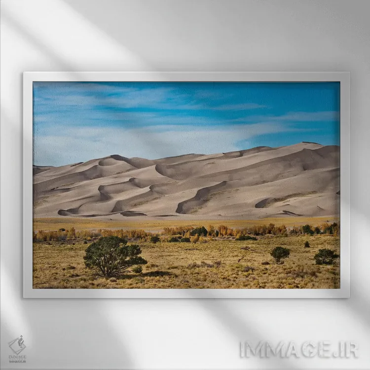 تابلو "آمریکا، کلرادو، آلاموسا، پارک ملی تپههای شنی بزرگ I" اثر برنارد فریل - نمای قابدار سفید