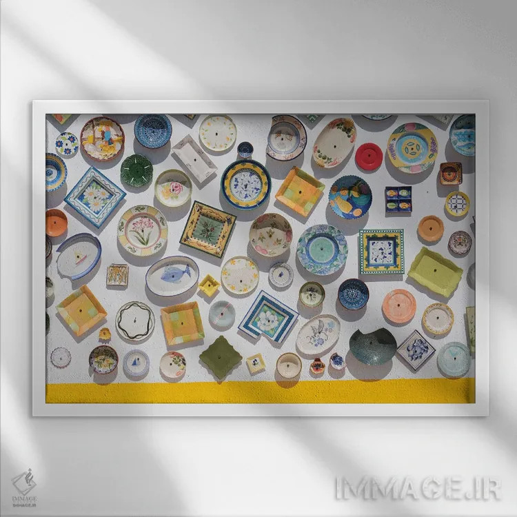 تابلو بشقابهای رنگارنگ اثر گیلیارد برسسان - نمای قابدار سفید