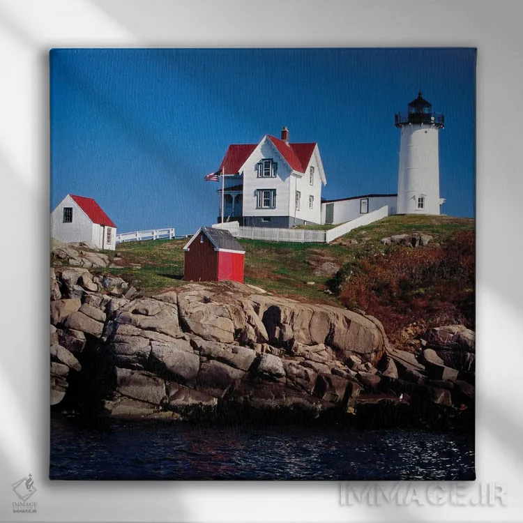 تابلو نمای فانوس دریایی کیپ ندیک، یورک، مین، آمریکا اثر جورج اوزه - نمای روبهرو روی دیوار