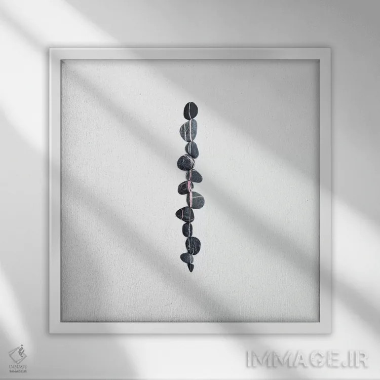 تابلو سنگریزهها اثر اینگرید بدوز - نمای قابدار سفید