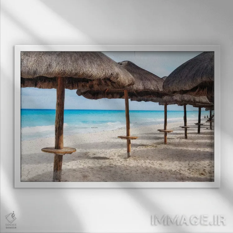 تابلو دکوراتیو کلبه های ساحلی کنار هم در کانکون، مکزیک اثر جورج اوزه - نمای قابدار سفید