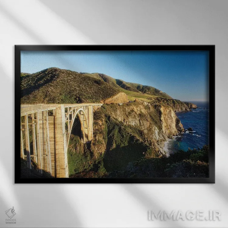 تابلو دکوراتیو نمای پانورامایی از خط ساحلی بیگ سور در پل بیکسبی، کالیفرنیا اثر جورج اوزه - نمای قابدار مشکی