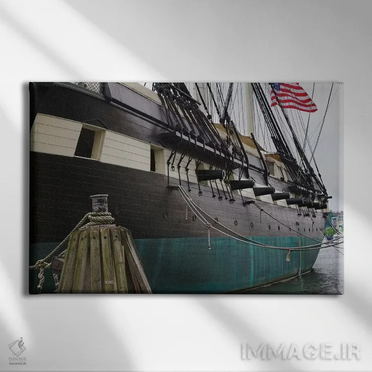 تابلو دکوراتیو نمای نزدیک از سمت بندر ناوشکن کانستلیشن، بندر بالتیمور، مریلن… اثر جورج اوزه - نمای روبهرو روی دیوار