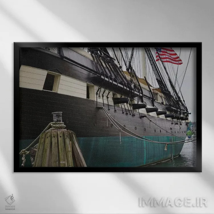 تابلو دکوراتیو نمای نزدیک از سمت بندر ناوشکن کانستلیشن، بندر بالتیمور، مریلن… اثر جورج اوزه - نمای قابدار مشکی