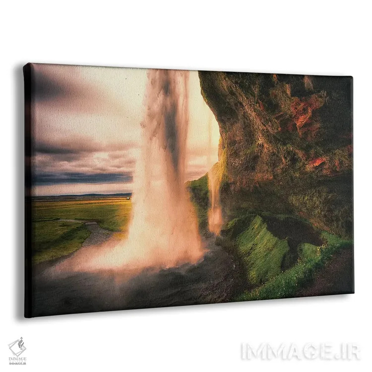 تابلو دکوراتیو دید آبشار سلجالاندسفوس از داخل غار در هنگام غروب، ایسلند اثر جورج اوزه - نمای پرسپکتیو محصول