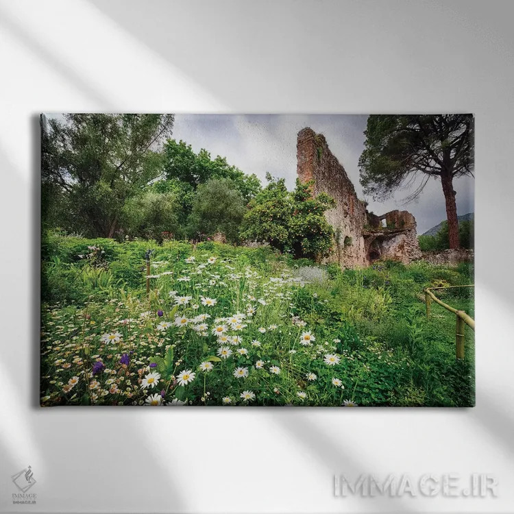 تابلو دکوراتیو ویرانه ها در باغی با گل ها و درخت پرتقال اثر جورج اوزه - نمای روبهرو روی دیوار