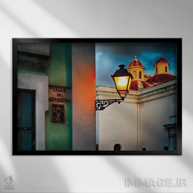 تابلو دکوراتیو گوشه خیابان سن خوان قدیمی با نمای کلیسا اثر جورج اوزه - نمای قابدار مشکی